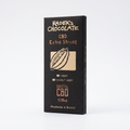 A single rectangular package of Radek's Chocolate CBD Extra Strong chocolate bar, standing upright on a clean white background. The packaging is matte black with gold and orange text and a small illustration of a cacao pod.